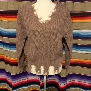Distressed sweater